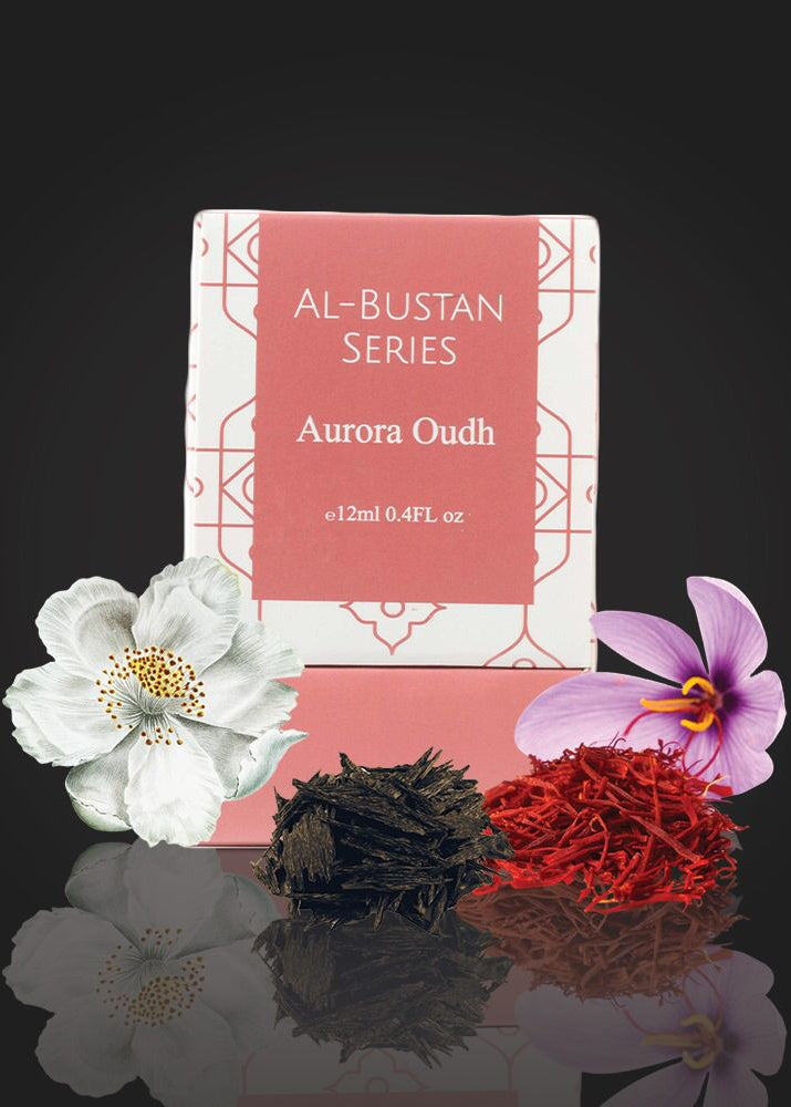 Al-Bustan Series Aurora Oudh packaging with saffron and flowers on a dark background