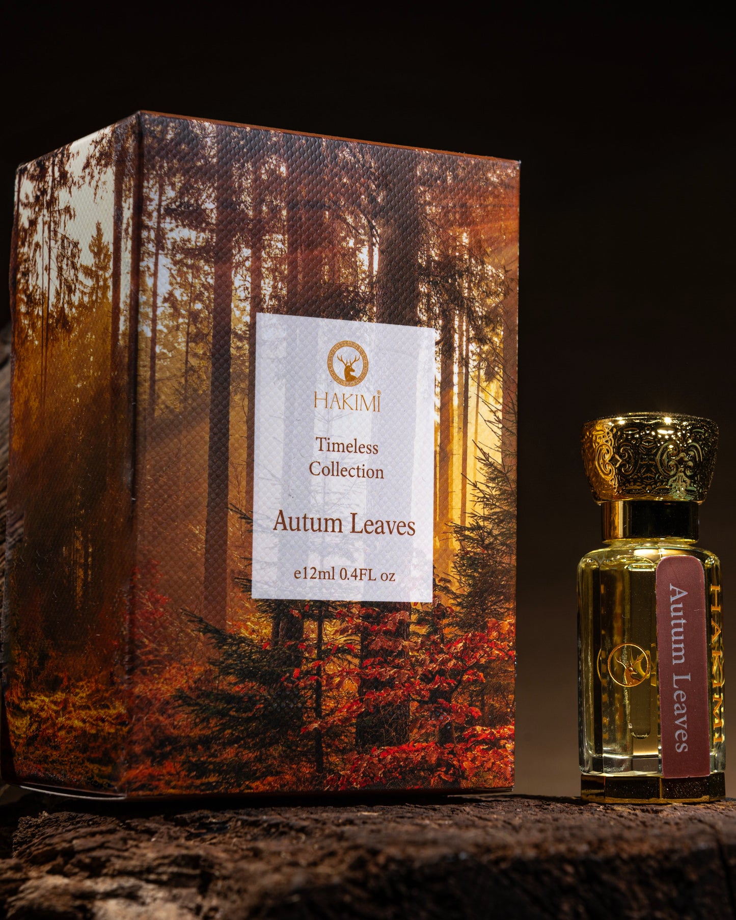 Autumn-themed perfume bottle and packaging on a wooden surface with a dark background