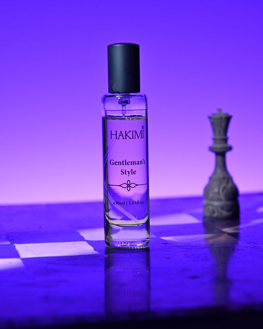 Hakimi Gentleman's Style perfume bottle on a reflective surface with a purple gradient background