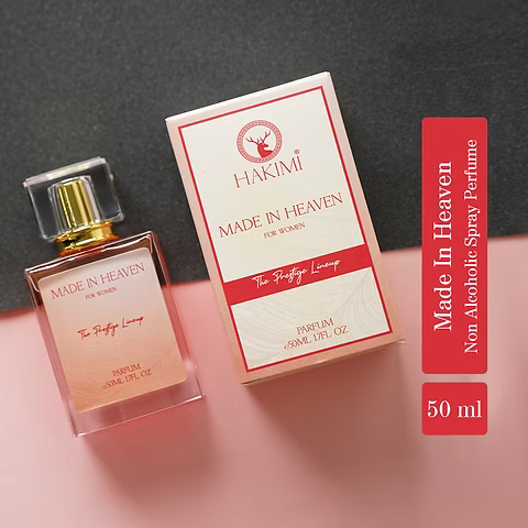 Hakimi 'Made in Heaven' perfume bottle and packaging on a pink and gray background