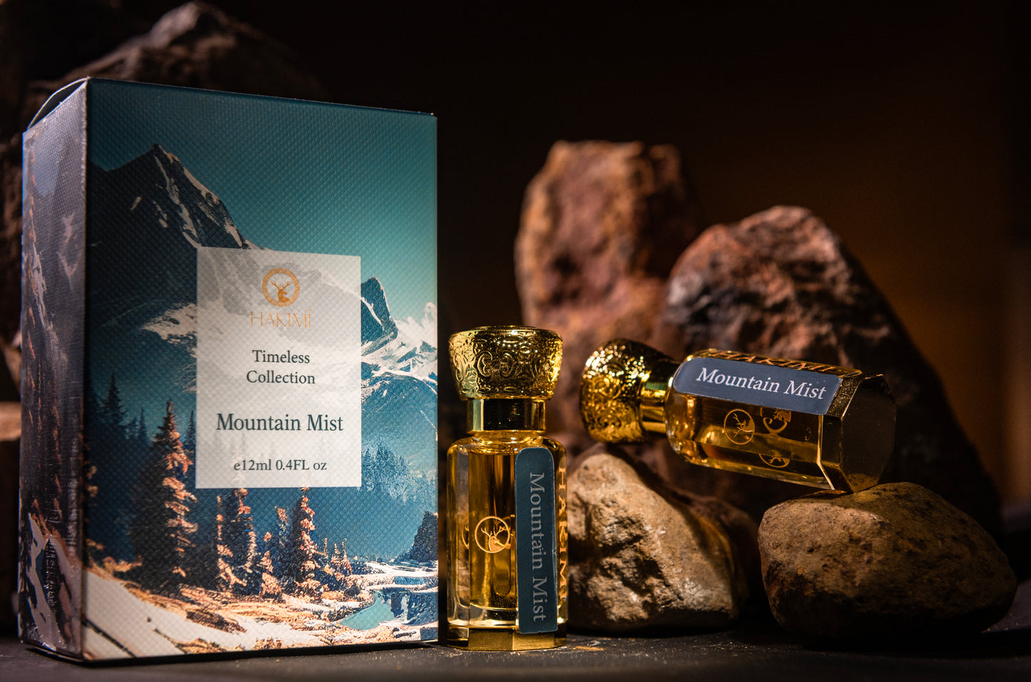 Perfume bottles labeled 'Mountain Mist' with packaging featuring mountain scenery on a dark background.