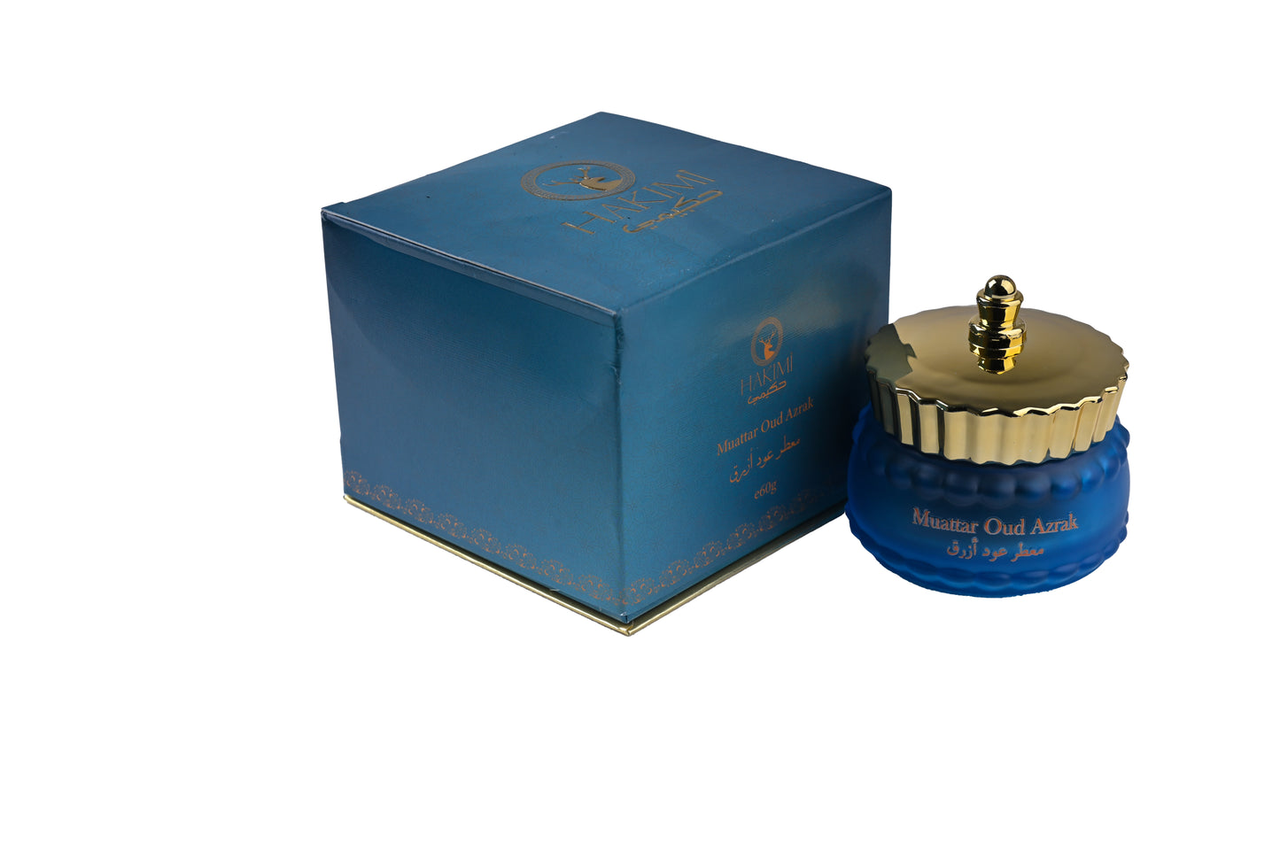 Blue perfume bottle with gold cap and matching box on a white background