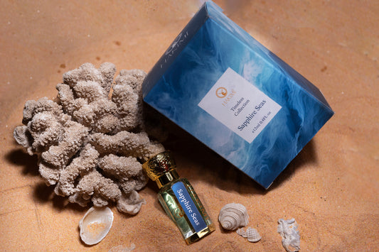 Sophie's Sea product packaging with coral and shells on a sandy background