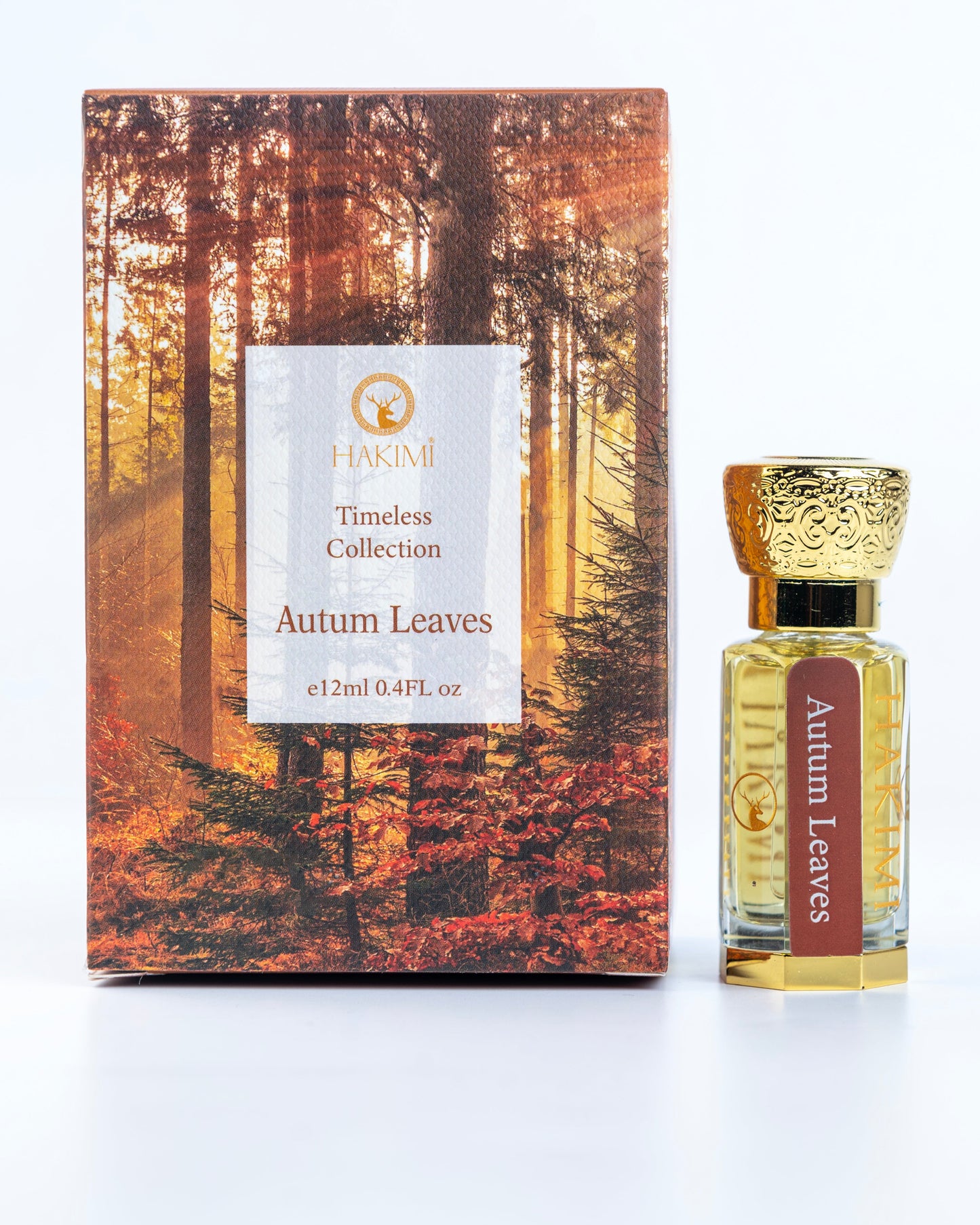 Perfume bottle and packaging with 'Autumn Leaves' design on a white background