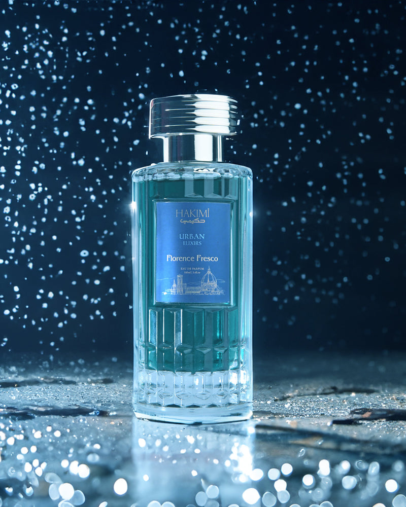 Perfume bottle with a starry night background