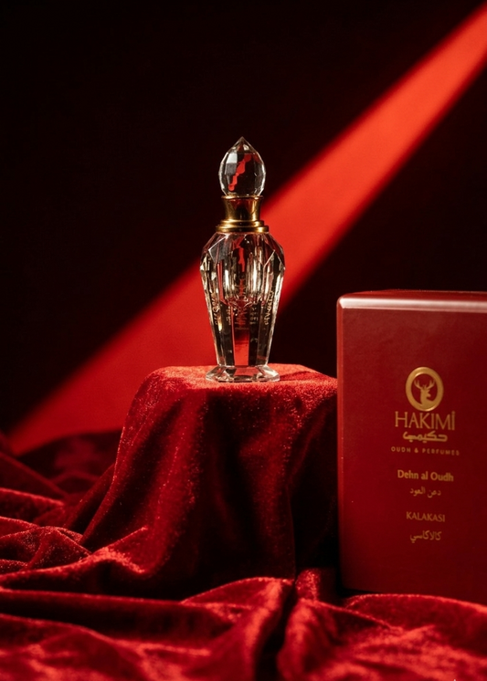 Crystal perfume bottle with red box on a red fabric background