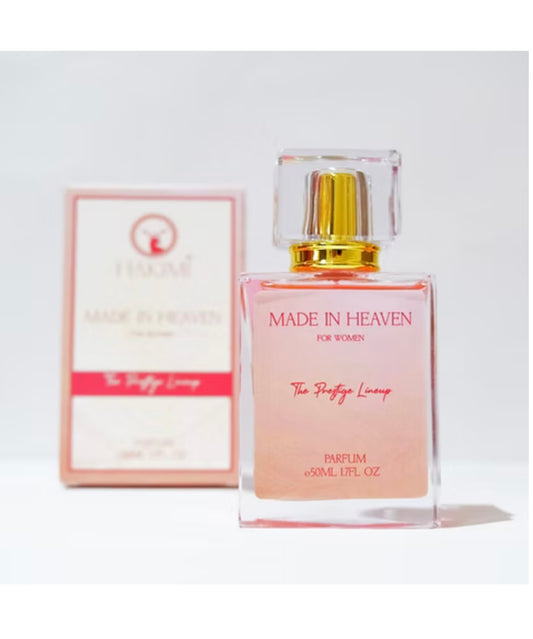 Perfume bottle labeled 'Made in Heaven' with packaging on a white background