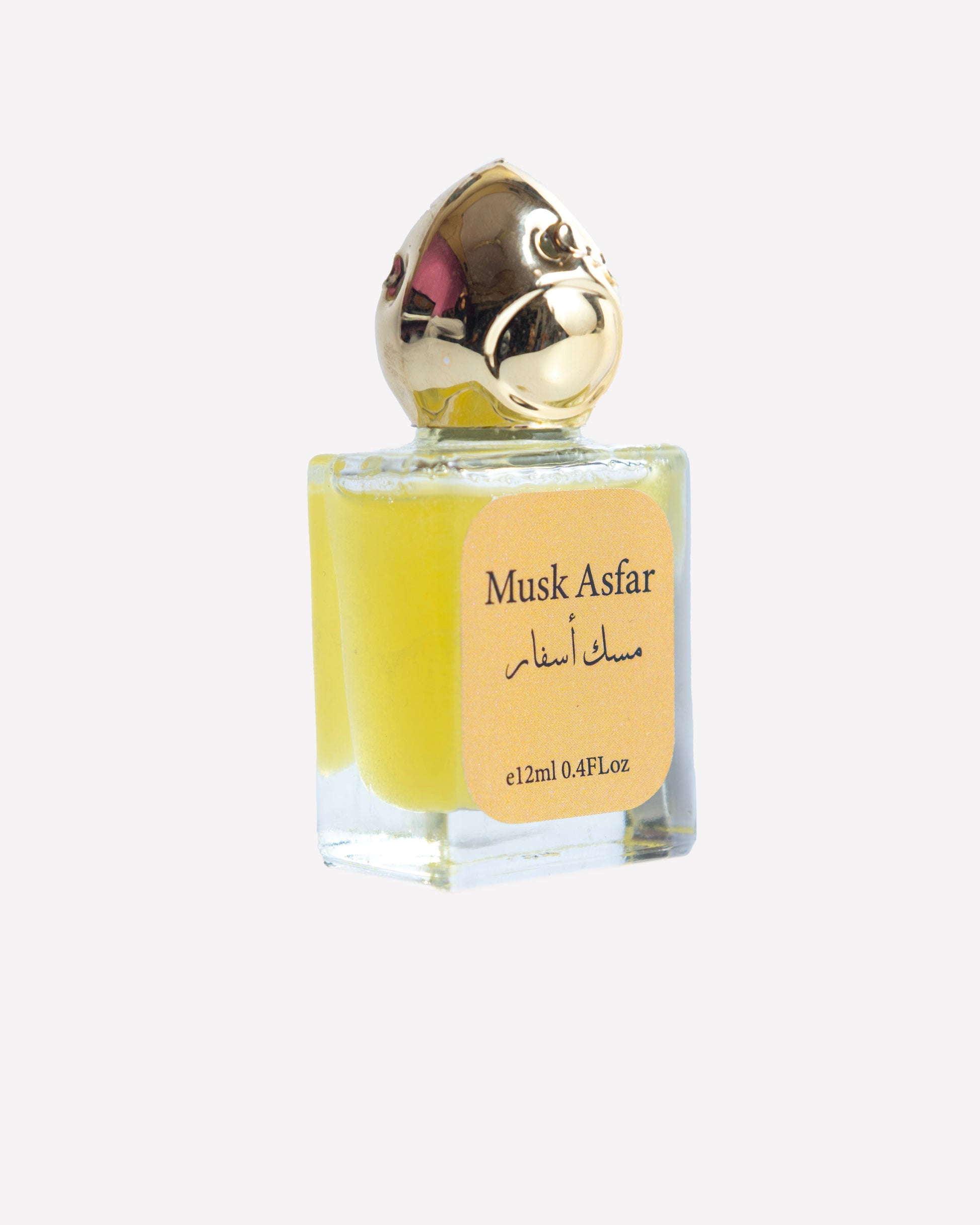 Perfume bottle labeled 'Musk Asfar' on a white background