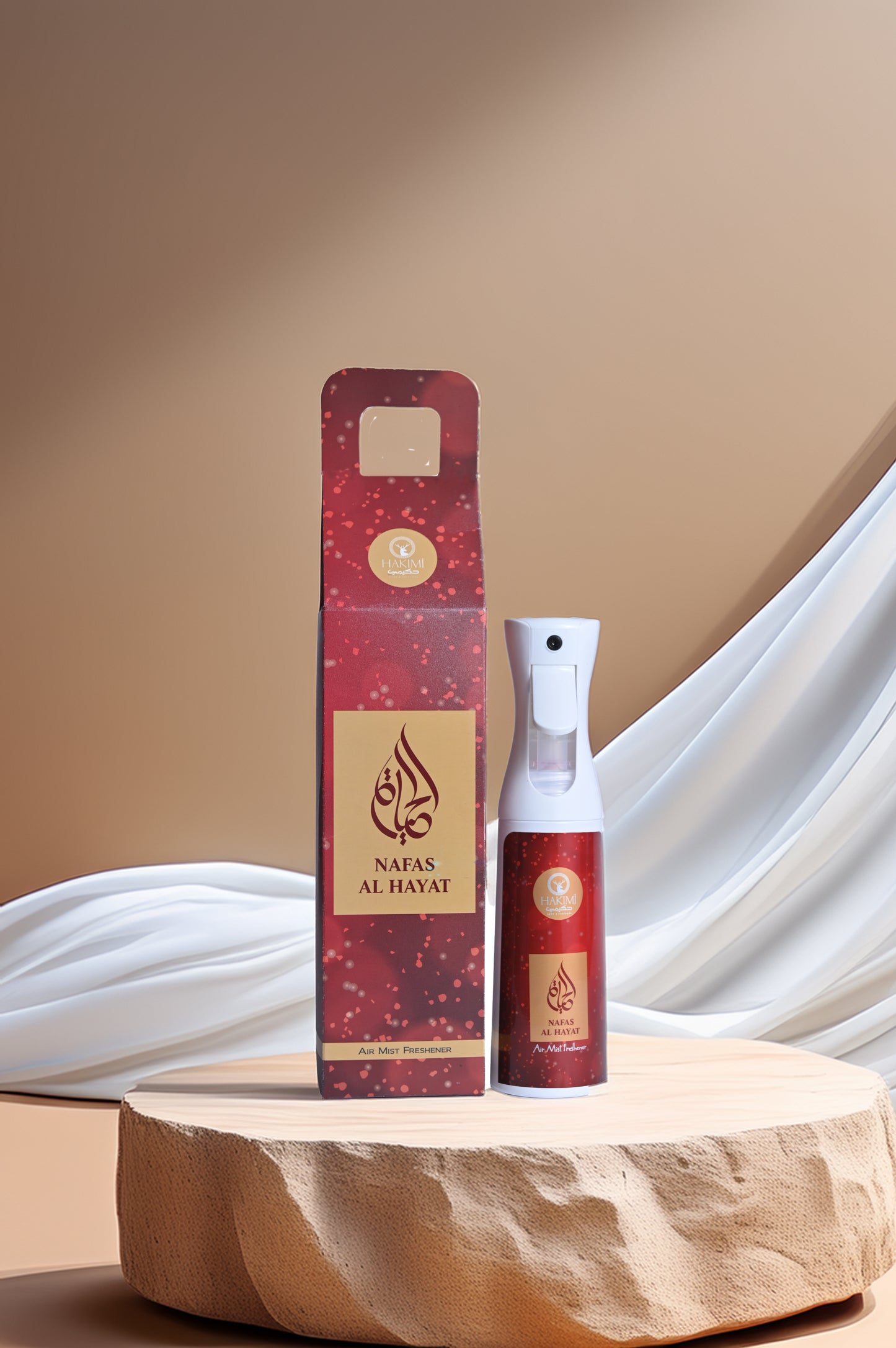 Red spray bottle and packaging on a wooden surface with a white fabric background