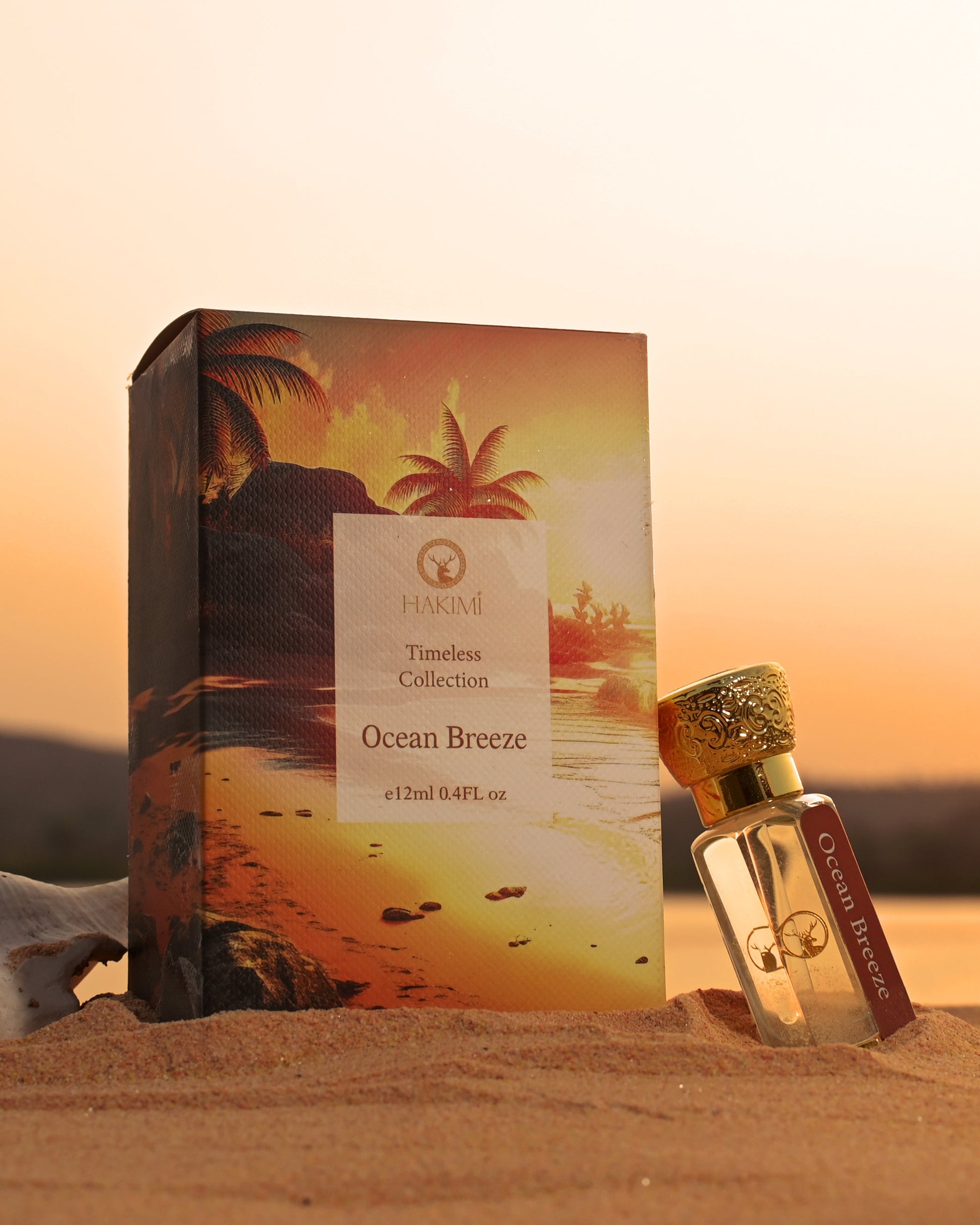 Perfume bottle and packaging with 'Ocean Breeze' theme on a desert background