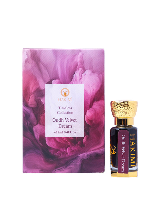 Perfume bottle and packaging with floral design on a white background
