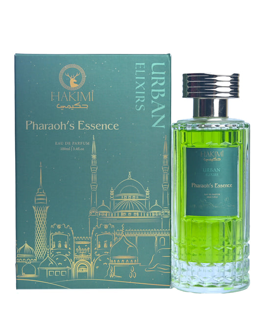Green perfume bottle with silver cap next to its packaging on a white background