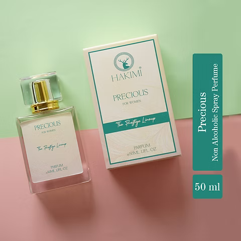 Hakimi Precious perfume bottle and packaging on a pink and green background
