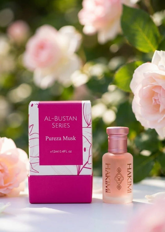 Perfume bottle and packaging with pink flowers in the background
