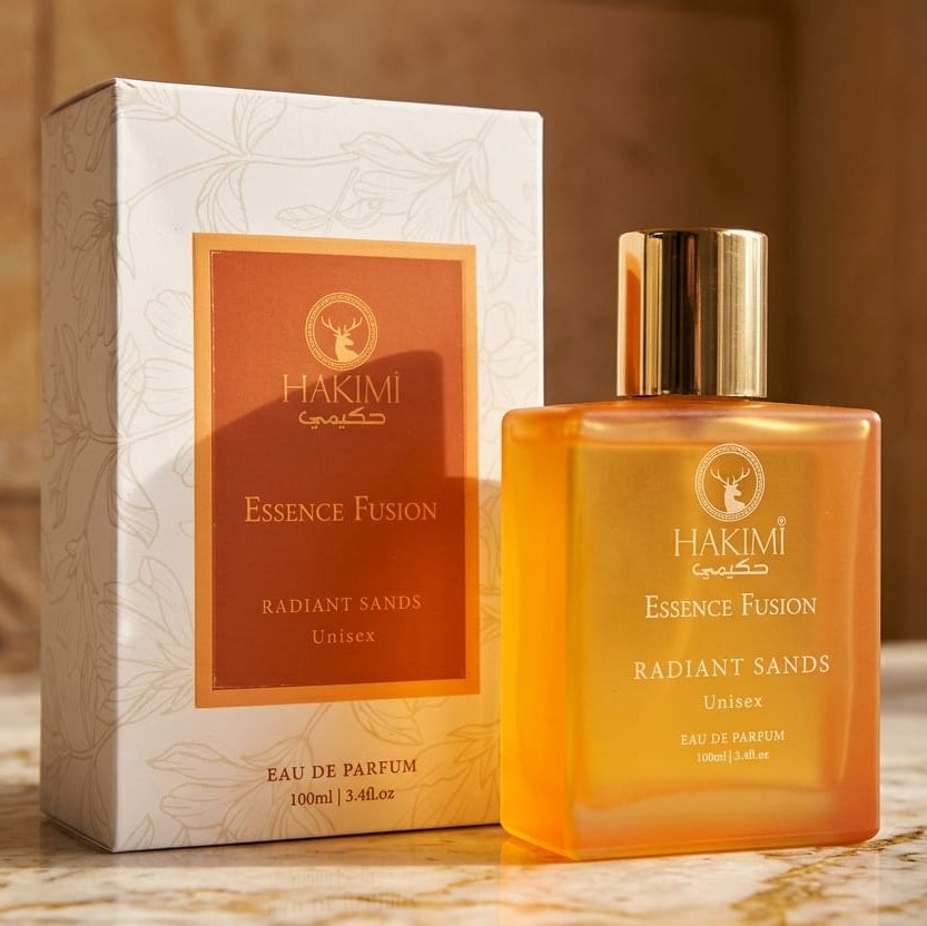 Hakimi Essence Fusion Radiant Sands perfume bottle and packaging on a wooden surface.