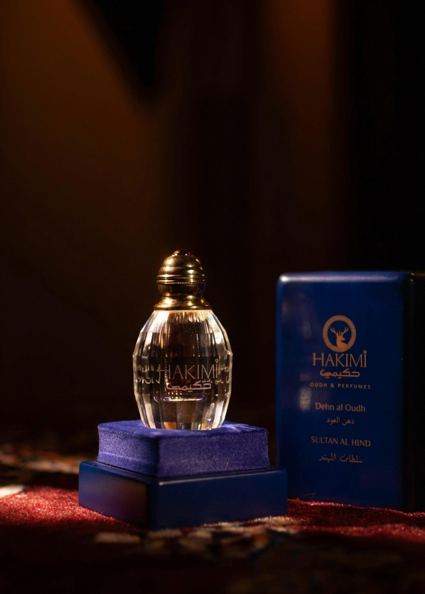 Hakimi perfume bottle and packaging on a dark background