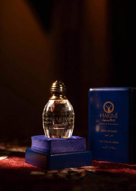 Hakimi perfume bottle and packaging on a dark background