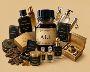 A luxury perfume gift set featuring multiple glass bottles, amber-toned liquids, black and gold boxes, and a central jar labeled 'ALL' on a warm beige background.