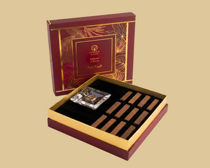 Decorative box with a crystal and chocolate bars on a beige background