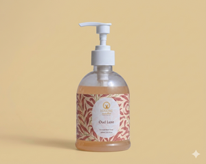 Bottle of Oud Luxe soap with a pump on a beige background